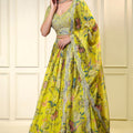 Trendy Yellow Floral Printed Lehenga Choli with Mirror Work and Matching Dupatta for Wedding