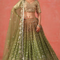 Traditional Mehndi Green Georgette Embroidered Lehenga Choli with Soft Net Dupatta