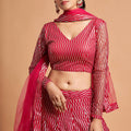 Stunning Hot Pink Soft Net Sequins Embroidered Lehenga Choli with Dupatta