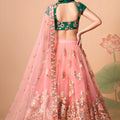 Elegant Peach Soft Net Embroidered Lehenga Choli with Green Silk Blouse and Dupatta