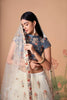 Charming Cream Soft Net Embroidered Lehenga Choli with Grey Blouse and Dupatta