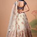 Charming Cream Soft Net Embroidered Lehenga Choli with Grey Blouse and Dupatta