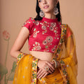 Imperial Mustard Yellow Soft Net Embroidered Lehenga Choli with Red Blouse and Dupatta