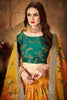 Luxurious Green Embroidered Silk Blouse with Yellow Floral Printed Organza Lehenga Choli