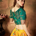 Luxurious Green Embroidered Silk Blouse with Yellow Floral Printed Organza Lehenga Choli