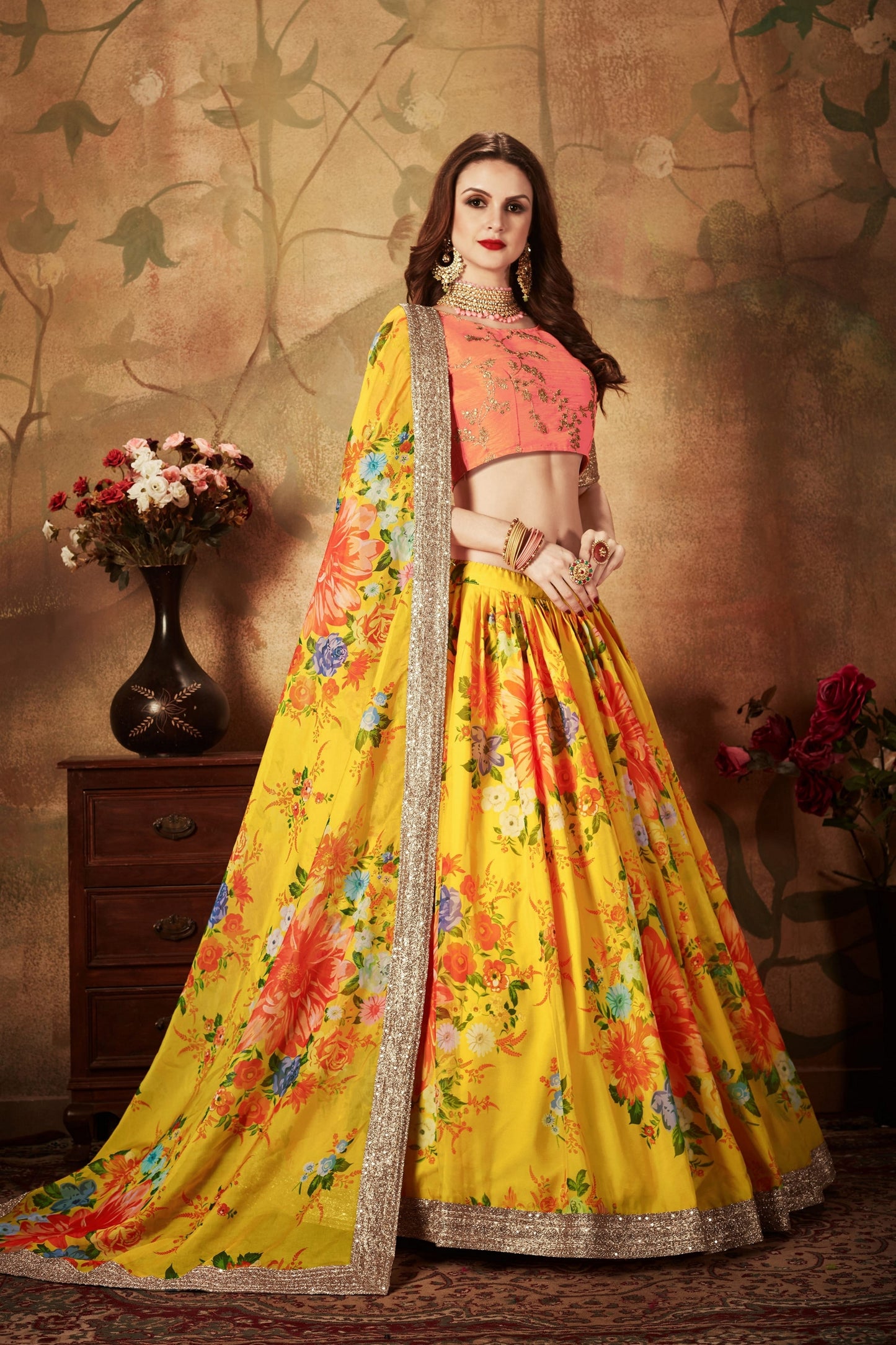 Vibrant Peach Embroidered Silk Blouse with Yellow Floral Printed Organza Lehenga Choli
