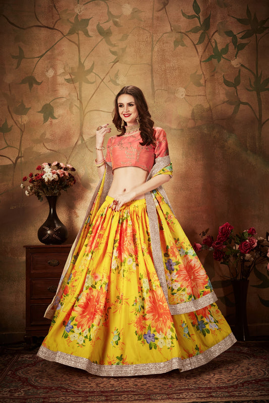 Vibrant Peach Embroidered Silk Blouse with Yellow Floral Printed Organza Lehenga Choli