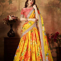 Vibrant Peach Embroidered Silk Blouse with Yellow Floral Printed Organza Lehenga Choli 
