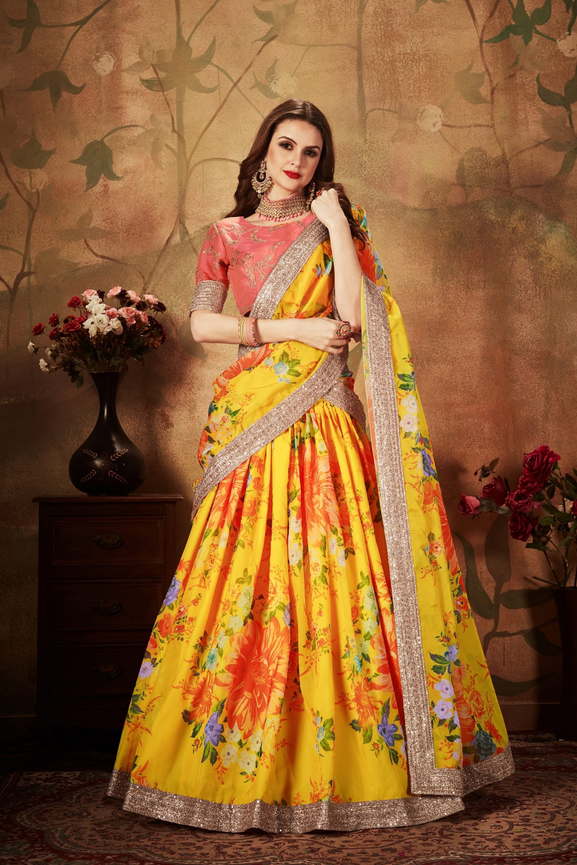 Vibrant Peach Embroidered Silk Blouse with Yellow Floral Printed Organza Lehenga Choli 