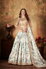 Elegant Beige Embroidered Silk Blouse with White and Green Floral Printed Organza Lehenga Choli