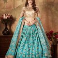 Festive Beige Embroidered Silk Blouse with Sky Blue Floral Printed Organza Lehenga Choli