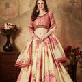 Delicate Peach Embroidered Silk Blouse with Cream Floral Printed Organza Lehenga Choli