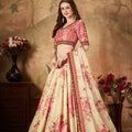 Delicate Peach Embroidered Silk Blouse with Cream Floral Printed Organza Lehenga Choli