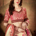 Delicate Peach Embroidered Silk Blouse with Cream Floral Printed Organza Lehenga Choli