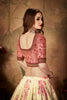 Delicate Peach Embroidered Silk Blouse with Cream Floral Printed Organza Lehenga Choli