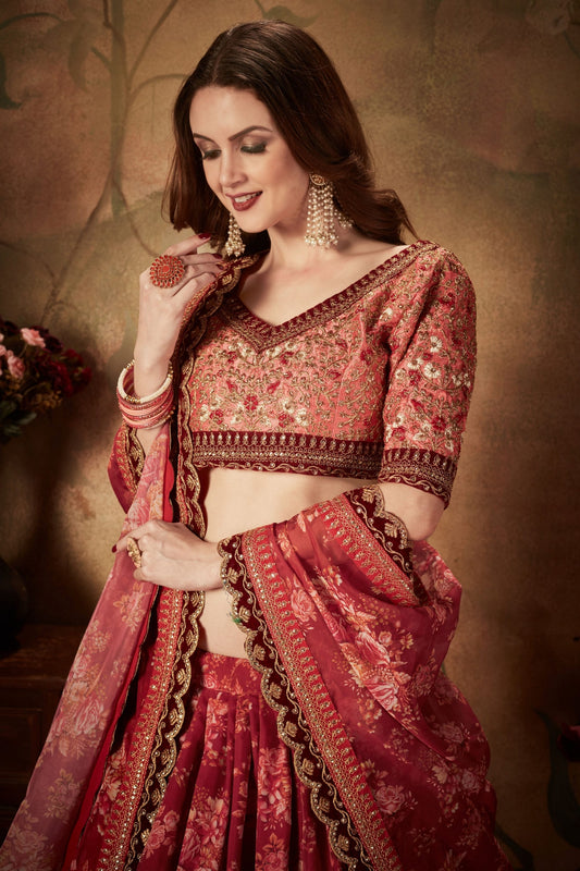 Stylish Peach Embroidered Silk Blouse with Red Floral Printed Organza Lehenga Choli