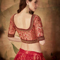Stylish Peach Embroidered Silk Blouse with Red Floral Printed Organza Lehenga Choli