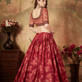 Stylish Peach Embroidered Silk Blouse with Red Floral Printed Organza Lehenga Choli