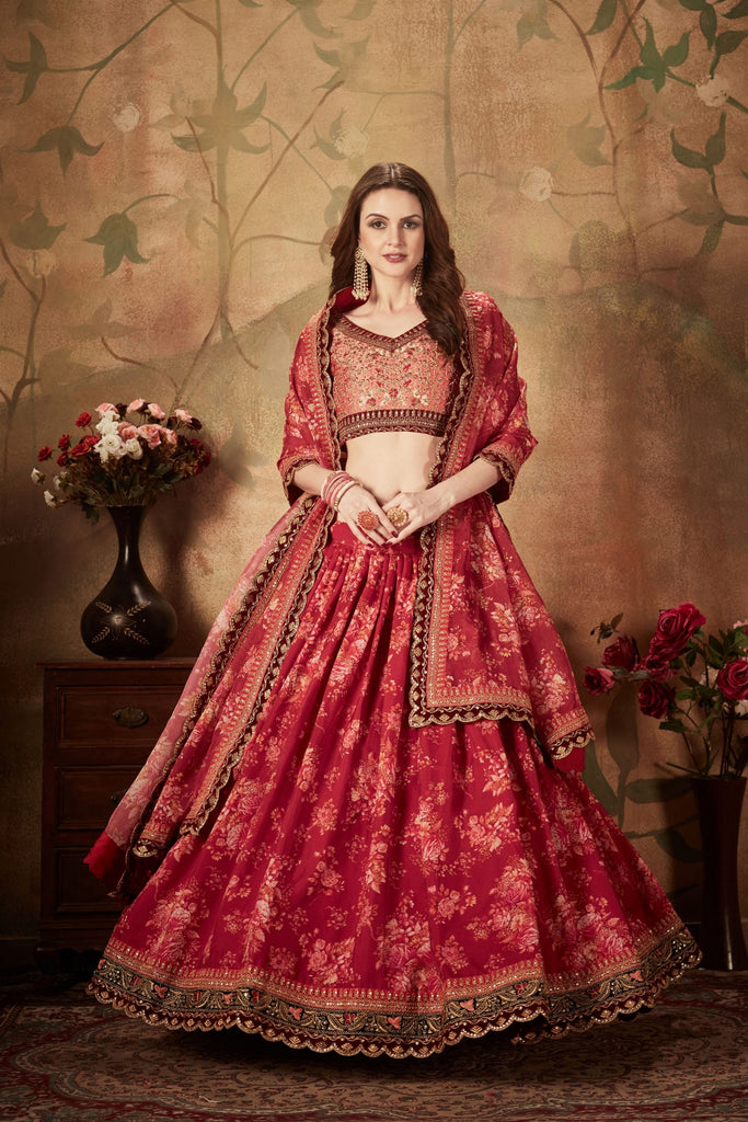 Stylish Peach Embroidered Silk Blouse with Red Floral Printed Organza Lehenga Choli