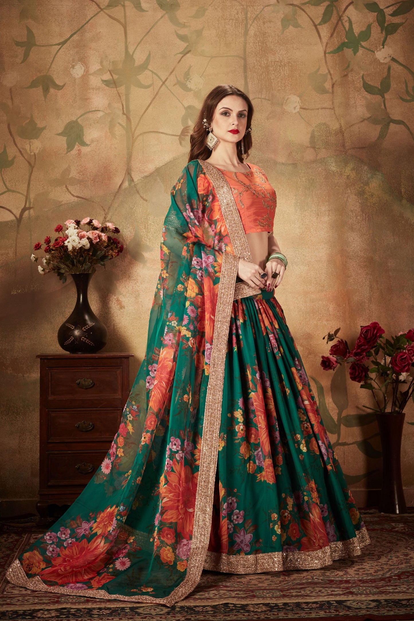 Trendy Orange Embroidered Silk Blouse with Green Floral Printed Organza Lehenga Choli