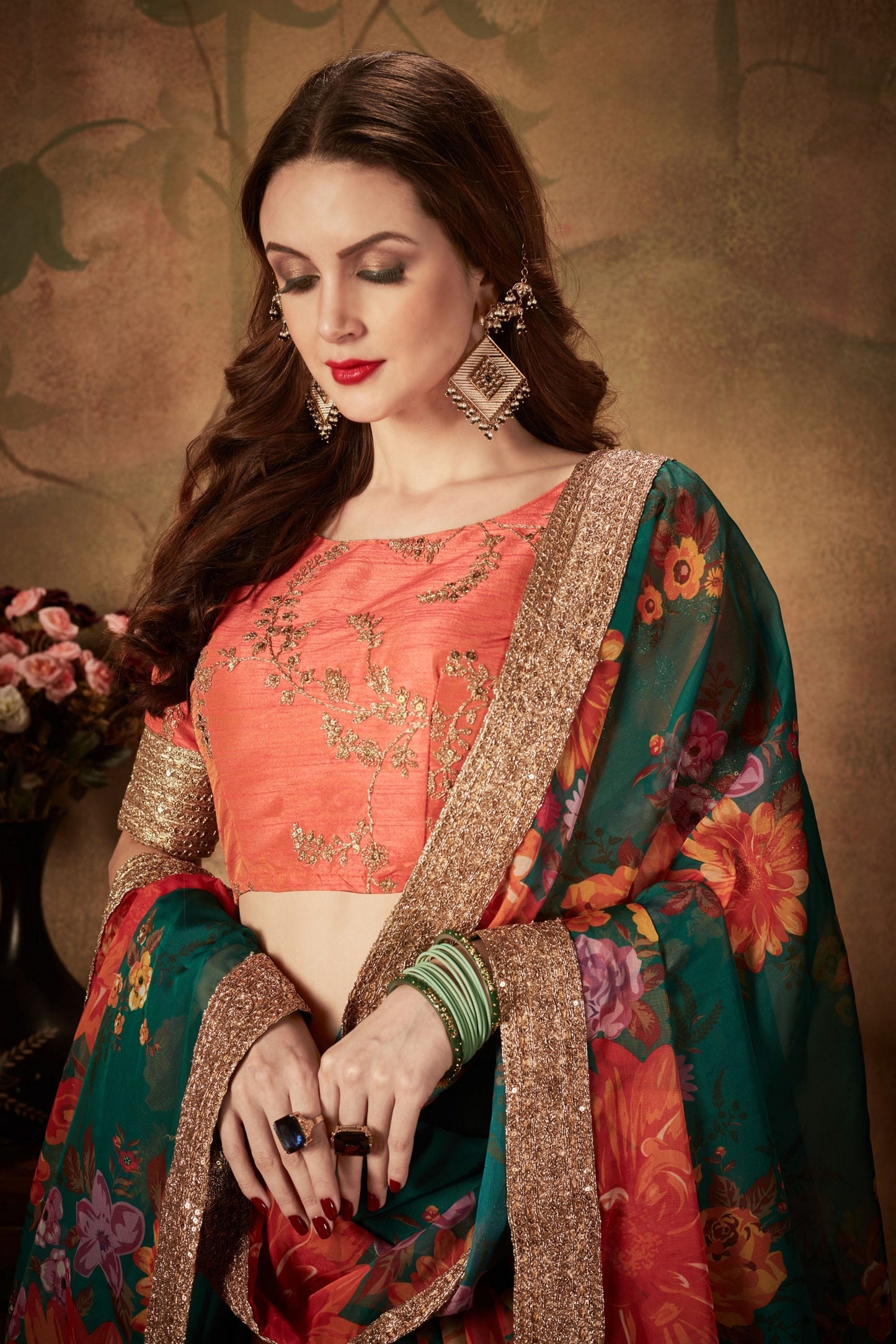 Trendy Orange Embroidered Silk Blouse with Green Floral Printed Organza Lehenga Choli