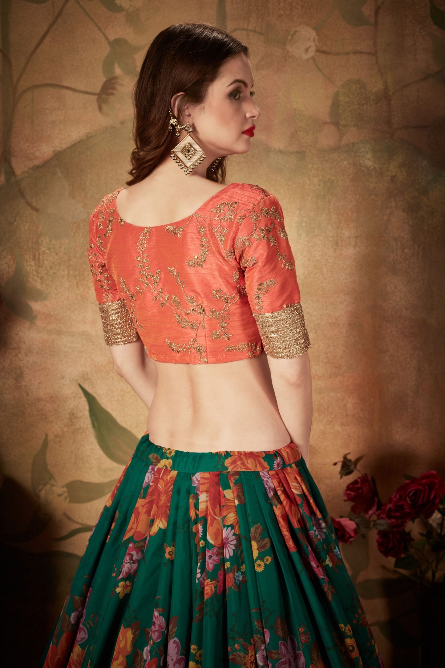 Trendy Orange Embroidered Silk Blouse with Green Floral Printed Organza Lehenga Choli