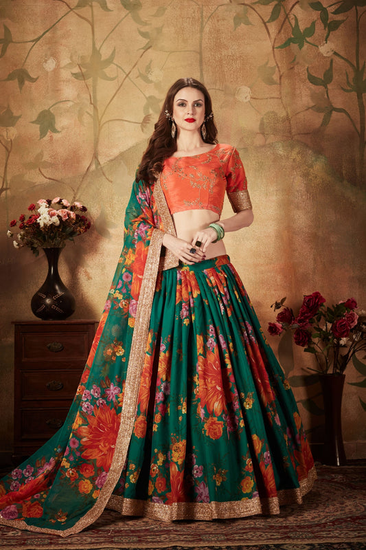 Trendy Orange Embroidered Silk Blouse with Green Floral Printed Organza Lehenga Choli