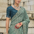 Sea Green Designer Saree with Embellished Border Teal Blouse