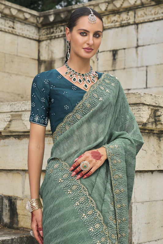 Sea Green Designer Saree with Embellished Border Teal Blouse