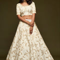 Impressive Off White Art Silk Heavy Embroidered Lehenga Choli with Soft Net Dupatta for Wedding