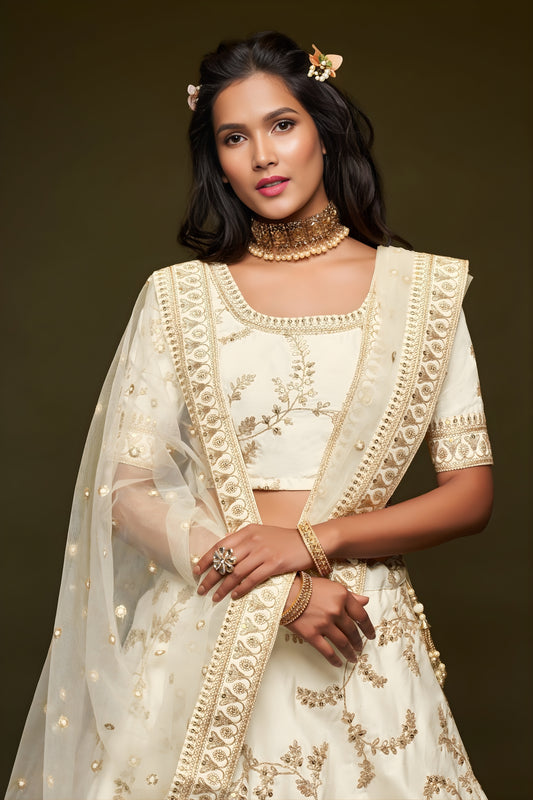 Impressive Off White Art Silk Heavy Embroidered Lehenga Choli with Soft Net Dupatta for Wedding