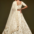 Impressive Off White Art Silk Heavy Embroidered Lehenga Choli with Soft Net Dupatta for Wedding