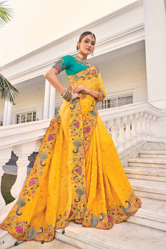 Yellow Silk Saree with Peacock Embroidery and Green Blouse