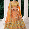 Sterling Mustard Yellow and Orange Embroidered Silk Bridal Lehenga Choli with Floral Work and Net Dupatta