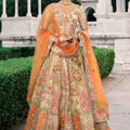 Graceful Beige and Orange Embroidered Silk Bridal Lehenga Choli with Floral Motifs and Net Dupatta