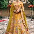 Vibrant Mustard Yellow Embroidered Silk Bridal Lehenga Choli with Traditional Motifs and Net Dupatta
