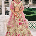 Charming Beige and Pink Embroidered Silk Lehenga Choli with Net Dupatta for Wedding