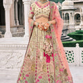Gorgeous Beige and Mint Green Embroidered Silk Lehenga Choli with Pink Net Dupatta for Wedding