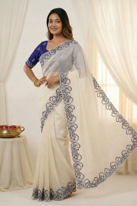 Off White Organza Saree with Blue Embroidered Border