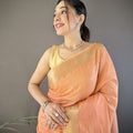 Peach Linen Silk Saree with Rich Golden Zari Border Tassel Pallu