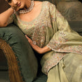Pista Green Embroidered Silk Saree with Heavy Border Matching Blouse