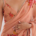 Peach Floral Printed Georgette Saree with Sequins Border Spaghetti Blouse