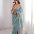Elegant Sky Blue Linen Designer Saree with Mirror Work Border