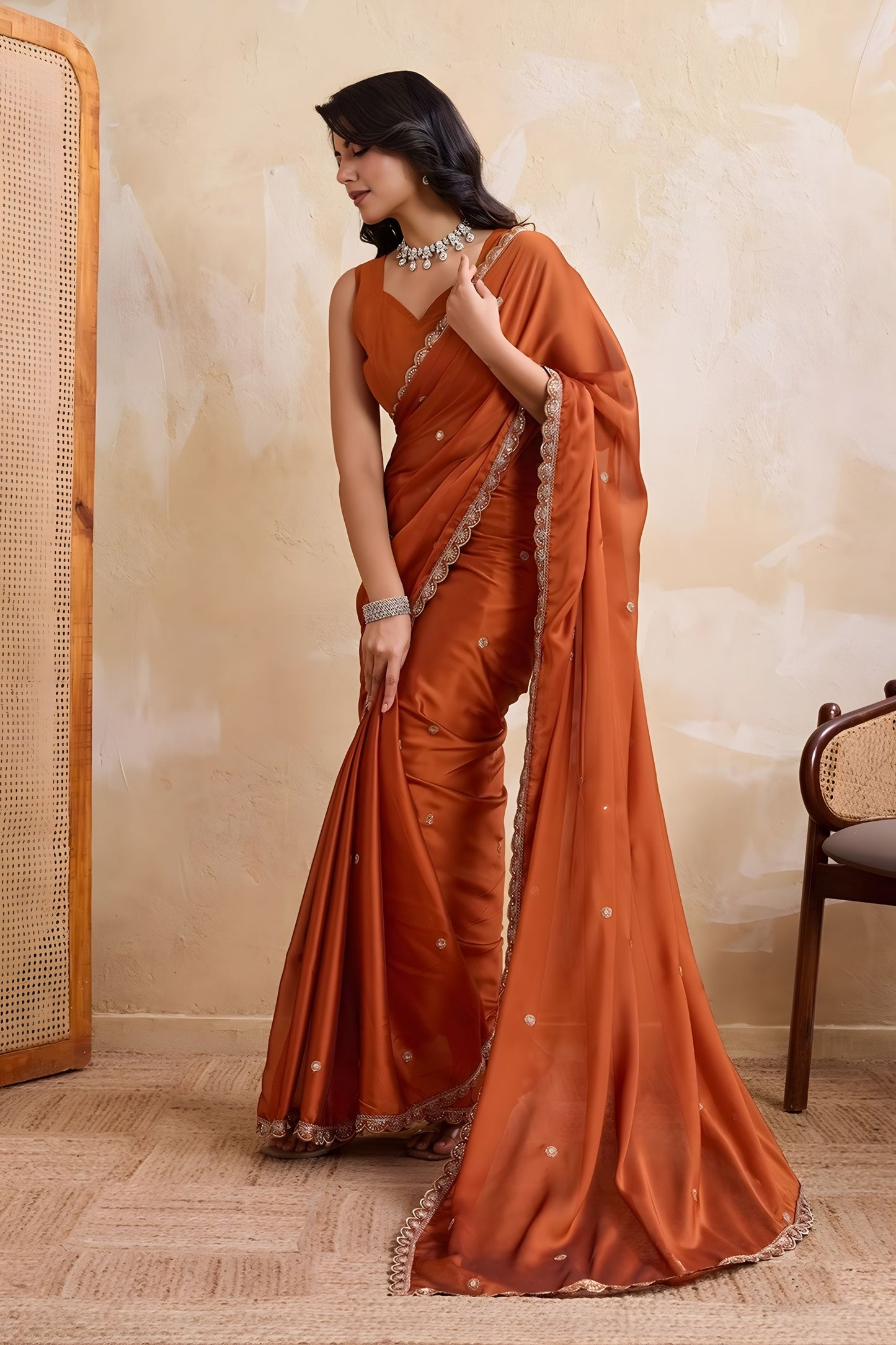 Rust Orange Georgette Saree with Silver Zari Border Butti Work