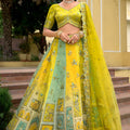 Glorious Lime Yellow Embroidered Silk Bridal Lehenga Choli with Net Dupatta for Women
