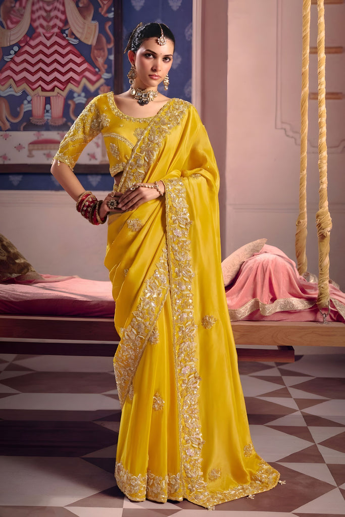 Yellow Georgette Saree with Heavy Zari Embroidery Designer Blouse