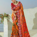 Vibrant Orange Pure Patola Silk Saree with Original Mirror Moti & Cut-Dana Work for Women