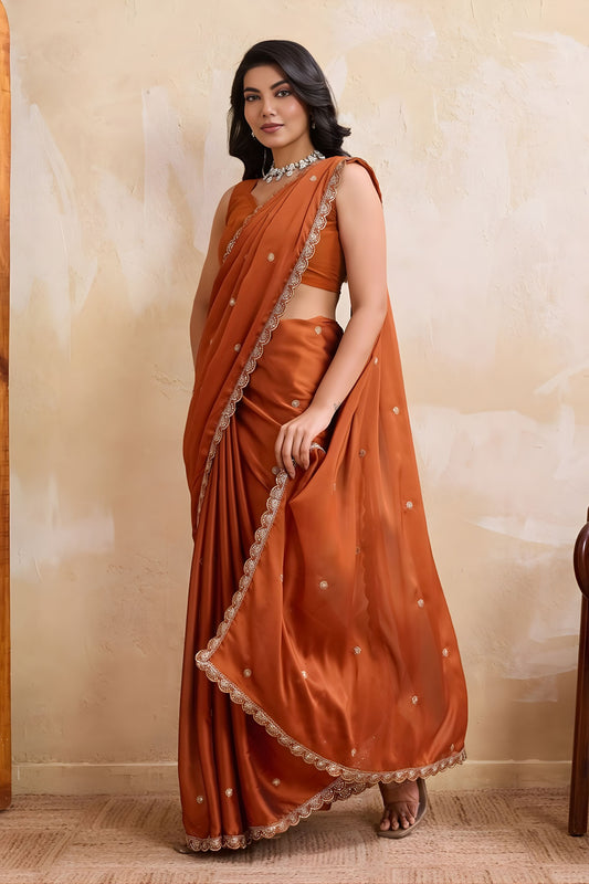 Rust Orange Georgette Saree with Silver Zari Border Butti Work