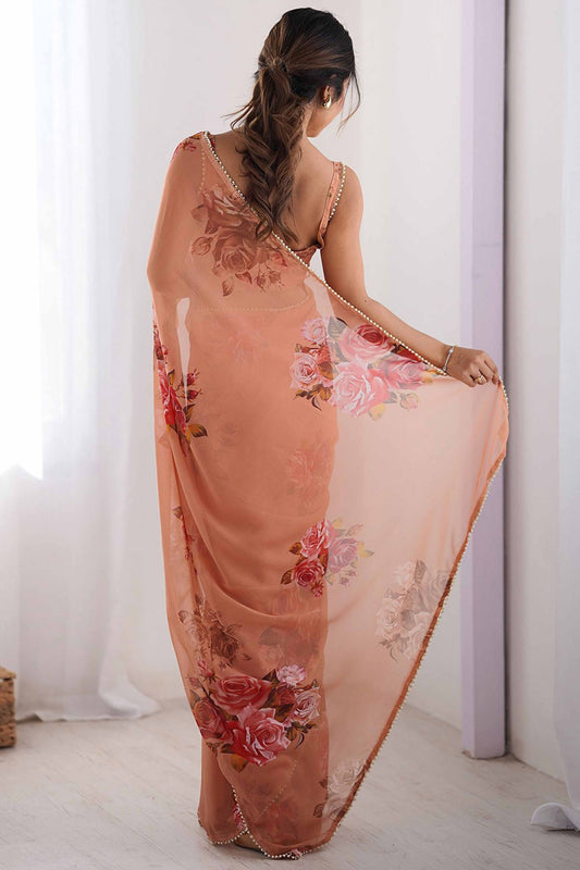 Peach Floral Printed Georgette Saree with Sequins Border Spaghetti Blouse
