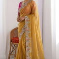 Mustard Yellow Tissue Silk Saree with Heavy Floral Embroidered Border